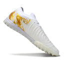 Chuteira Society Nike Phantom GX2 Elite Branca e Dourada